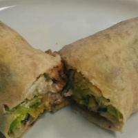 Vegetarian Burrito · Filled with rice, your choice of beans, homemade guacamole, sour cream and monterrey cheese