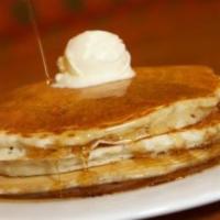 Pancakes · Three of our fluffy buttermilk pancakes served with whipped butter and warm syrup.