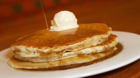 Pancakes · Three of our fluffy buttermilk pancakes served with whipped butter and warm syrup.