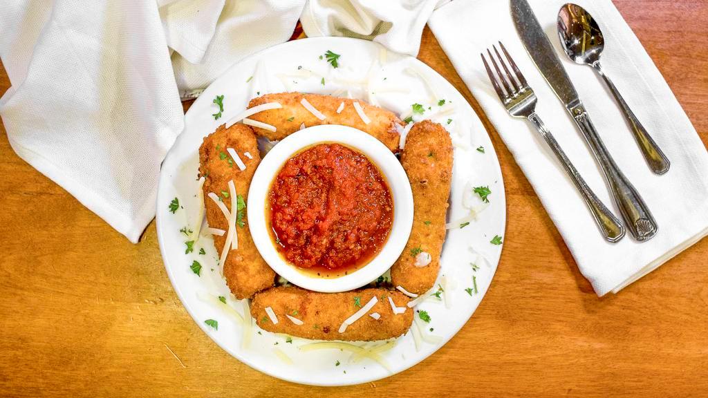 Jumbo Mozzarella Sticks · One of the dishes we are most famous for. We dip large sticks of mozzarella cheese in our own special batter and fry them until crisp. Served with freshly made marinara sauce.