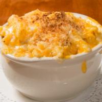 Mac & Cheese · Penne pasta tossed with our own house-made creamy cheese sauce and sprinkled with a crunchy ...