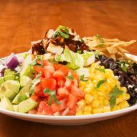 BBQ Chicken Tortilla Salad · Iceberg lettuce, chicken, corn, black beans, tomatoes, red onions, avocado, cilantro, BBQ sa...