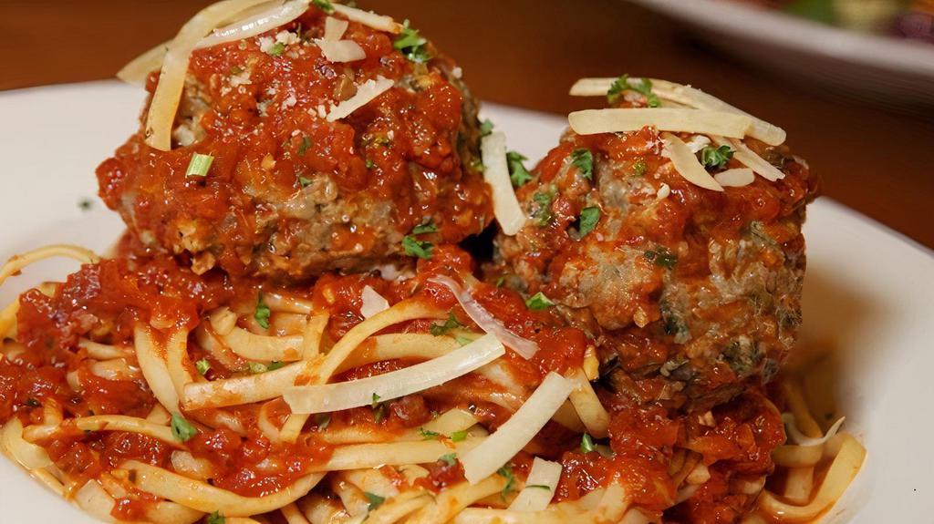 Linguine with Mozzarella Meatballs · Giant house-made meatballs stuffed with mozzarella cheese and topped with marinara sauce.