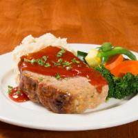 Mom's Meatloaf · House-made with 100% fresh Angus beef, sliced thick and topped with a sweet and tangy tomato...