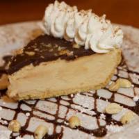 Peanut Buttercup Pie · A delectable, rich peanut butter mousse, topped with a layer of chocolate and a sprinkling o...