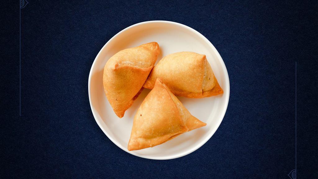 Vegetable Samosa/ 2 pieces · Idaho potatoes mixed in a curry marinate & fried in a crispy wheat layer. Served with tamarind chutney