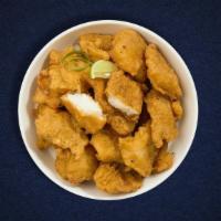 Fish Pakoras · Fish fillets mildly spiced, dipped in garbanzo batter and deep fried