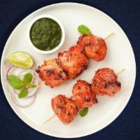 2 Pcs Chicken Kebab · Ground chicken lightly seasoned long kabab, baked in a tandoor clay oven