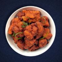 Chicken Pakora · Bite size crispy pieces of tandoori chicken, deep fried