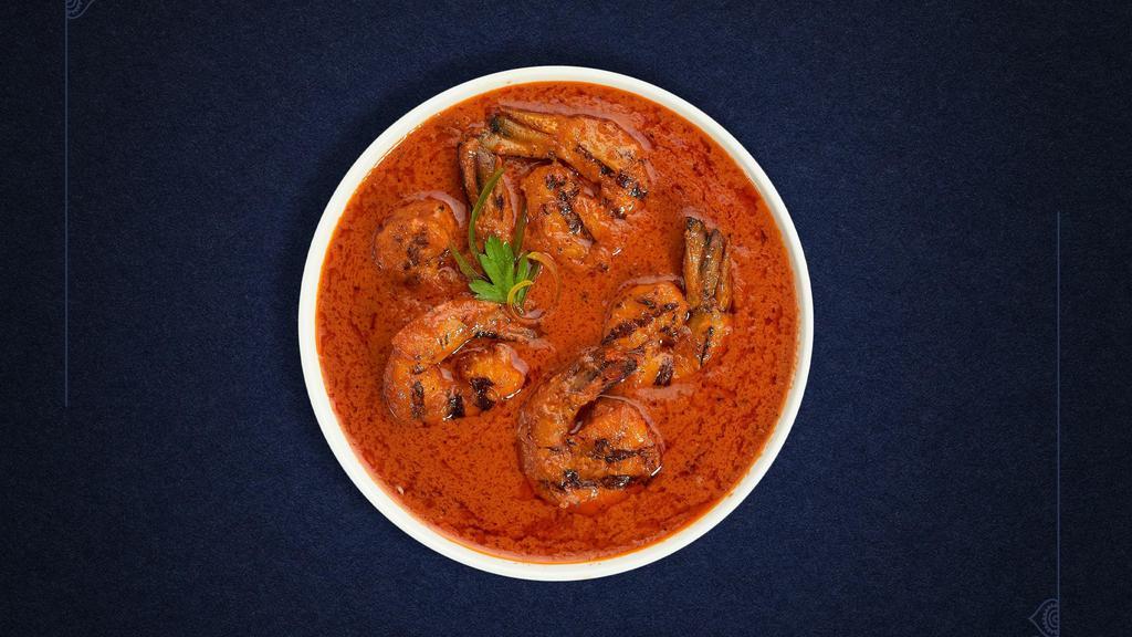 Prawns  Vindaloo · Jumbo prawns cooked in a spicy Vindaloo  curry with potatoes.