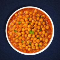 Saag Choley (Vegan) · Chickpeas & spinach  cooked in a tomato and onion gravy with spices