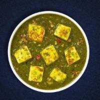 Saag Paneer · Cubes of fresh indian cheese cooked in a spinach gravy infused with garlic, ginge, and spices.