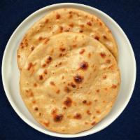 Roti (Tandoori Roti) · Whole wheat Indian bread cooked in a clay oven.