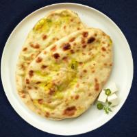 Cheesy & Spinach Naan · Bread Stuffed with mozzarella and parmesan cheese.