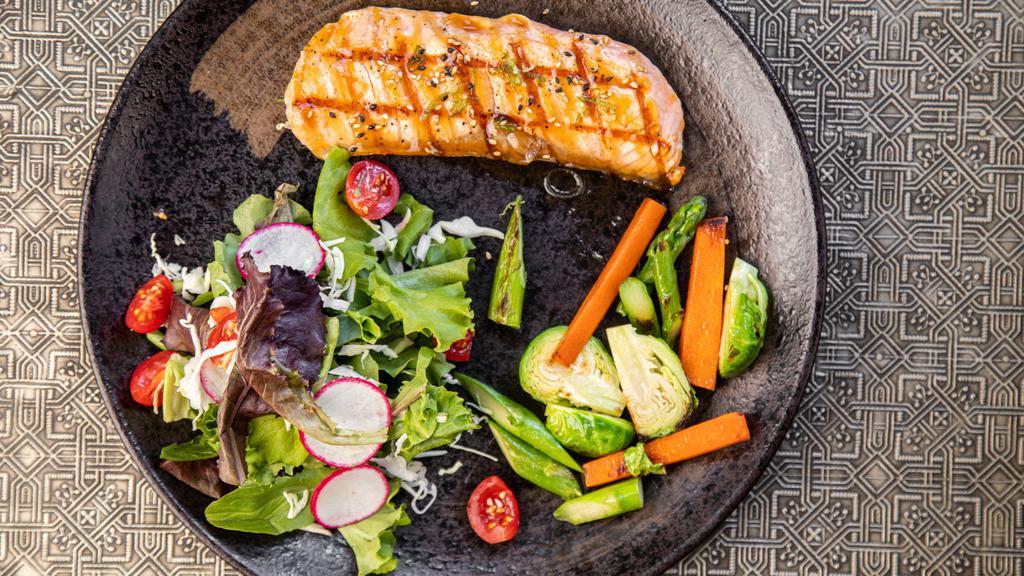 Salmon Teriyaki · grilled salmon fillet, glazed with our house teriyaki; served with carrots, yukon potatoes, miso soup and house salad