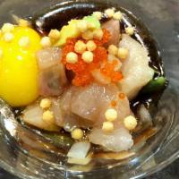 Daigo Shots · Diced hamachi, onions, quail egg, ponzu, tobiko, avocado, crispy rice, and truffle oil.
