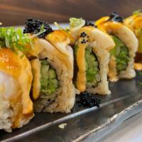 Hakashi Roll · Spicy tuna, avocado, and cucumber inside, topped with seared escolar, spicy mayonnaise, blac...