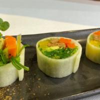 Green Special Roll · Wrapped in cucumber, sprouts, tofu skin, picked daikon, avocado, mountain carrots, and seawe...