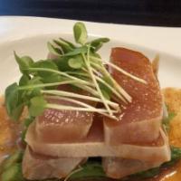 White Tuna Tataki · Seared white tuna with spicy garlic sauce tobiko.