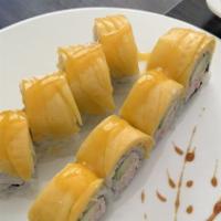 22. Sunset Roll · tempura shrimp and crab meat top with mango and spicy mango sauce