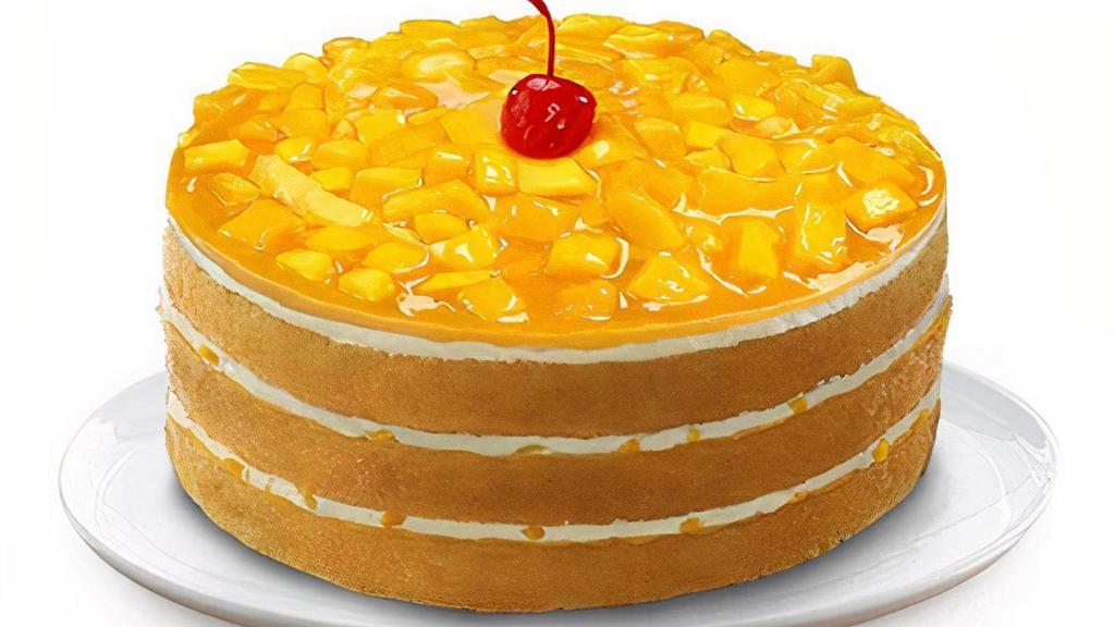 Mango Supreme · Three layers of moist white chiffon cake, filled with our signature cream, mango glaze and real Philippine mangoes. For its finishing touch, it is loaded with real mango chunks and a maraschino cherry on top. Our best-selling cake!