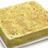 Sans Rival Big · Four-layers of meringue wafer, rich buttercream icing and scrumptious cashew nuts.
