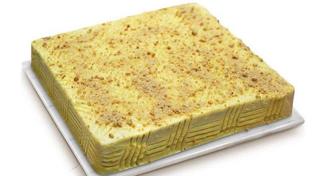 Sans Rival Big · Four-layers of meringue wafer, rich buttercream icing and scrumptious cashew nuts.