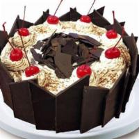 Black Forest · Layers of liqueur-moistened chocolate cake, brimming with maraschino cherries and cream, ric...