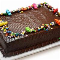 Chocolate Dedication Cake · Chocolate chiffon cake with rich fudgy chocolate icing and filling, decorated with colorful ...