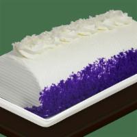 Ube Coconut Roll · Purple yam chiffon filled with cream & macapuno strings, finished with ube crumbs & coconut ...