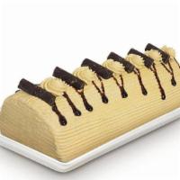 Mocha Roll · Creamy mocha icing and filling tucked in a roll of moist chiffon cake.