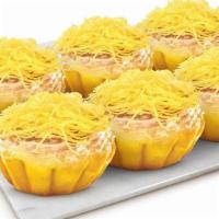 New  Cheesy Ensaimada - Pack Of 6 · Soft, moist bread topped with butter, sugar and cheesy deliciousness