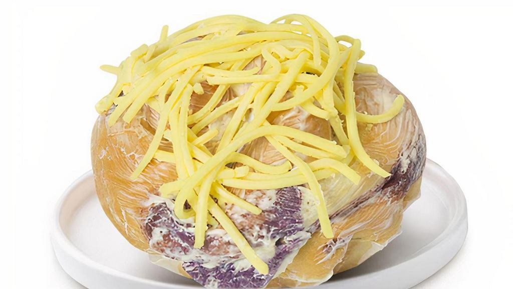 New Ube Ensaimada · Your favorite cheesy ensaimada, now filled with real ube halaya!