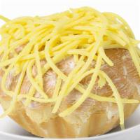 New Cheesy Ensaimada · Soft, moist bread topped with butter, sugar and cheesy deliciousness