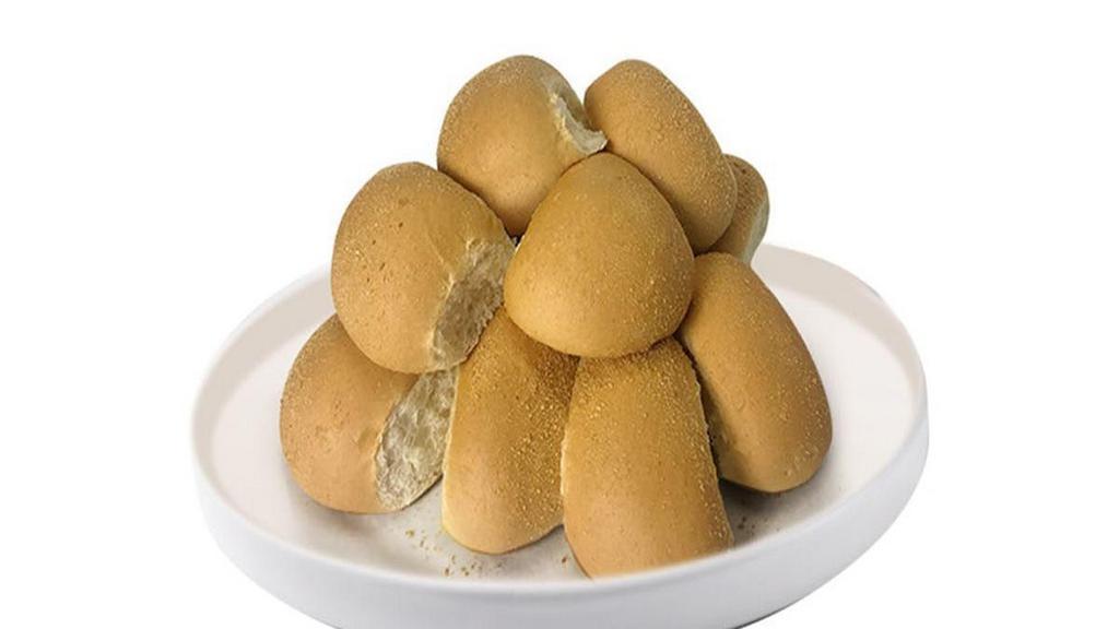 Pandesal · Classic soft bread buns rolled in bread crumbs