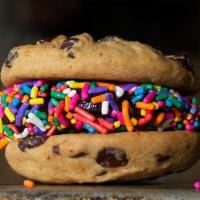Cookie Smash · Fudge Brownie smashed between two fresh baked chocolate chip cookies and coated with sprinkl...