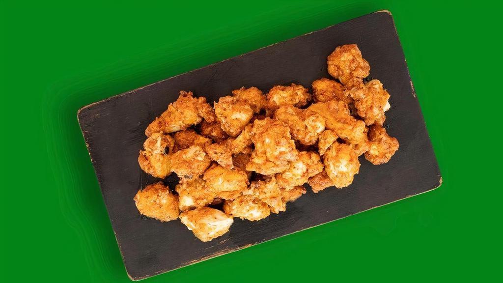 30 Boneless Wings · 30 Boneless wings with your choice of Classic Buffalo, This is Q'd Up, Honey Trap Mustard or Birthday Suit (Naked).