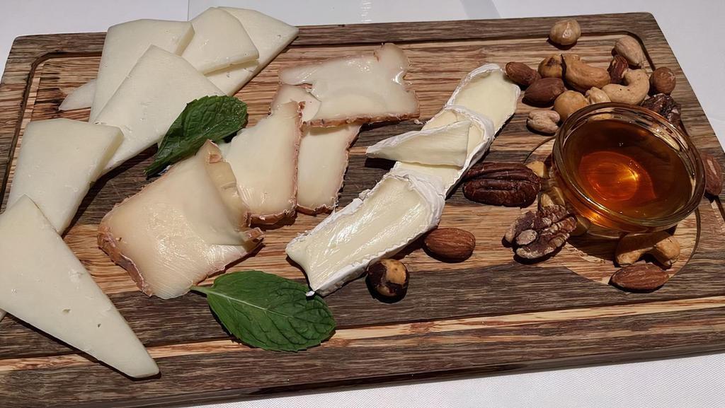 Cheese & Charcuterie · Honey, mixed nuts, fresh fruit.