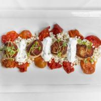 Grilled Atlantic Diver Scallops · Herbed couscous, roasted cherry tomatoes, labneh.