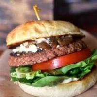 Beyond Burger · Plant-Based Patty, Goat Cheese, Stout-Braised Onions, Roasted-Poblano Buttermilk Dressing.