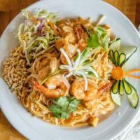 80. Pad Thai · Pan-fried rice noodles with choice of chicken or prawns, egg, tofu, bean sprouts, green onio...