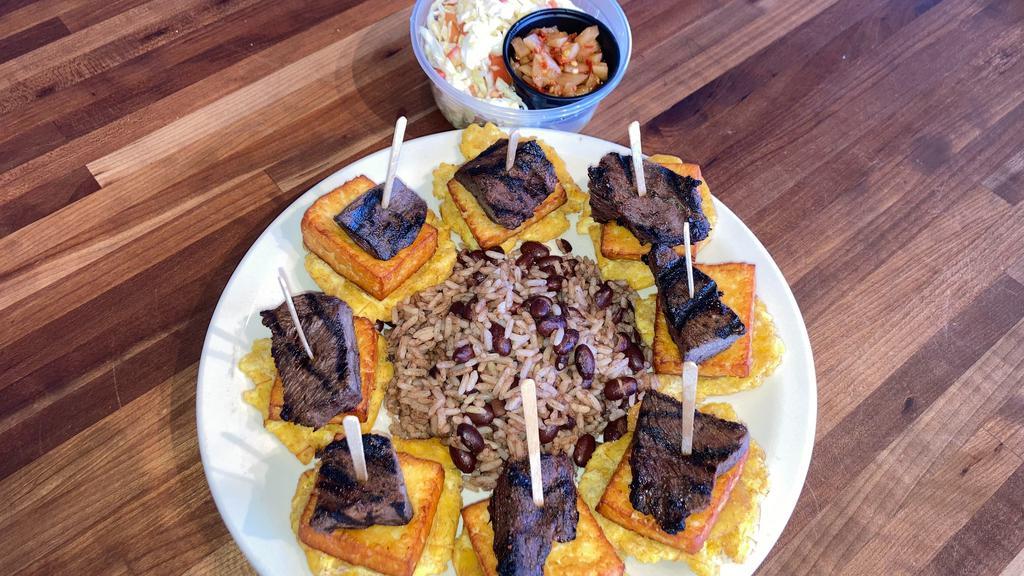 Tostones, Queso Frito, Carne Asada y Gallo Pinto 8pc · Tostones, Queso Frito, Carne Asada, Gallo Pinto y Ensalada (Fried Plantains, Fried Cheese, Grilled Steak, Rice & Beans and cabbage Salad) 8pc