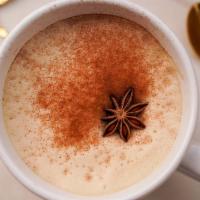 Chai · Homemade Chai Concentrate steamed with milk and topped with star anise.