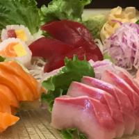 Assorted Sashimi Combo · 25 pieces (No Substitutions):
5 Maguro (Red Tuna), 5 Sake (Salmon), 5 Hamachi (Yellowtail), ...