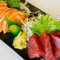 Tuna and Salmon Sashimi (8 pcs) · 4 pcs each of Tuna and Salmon Sashimi