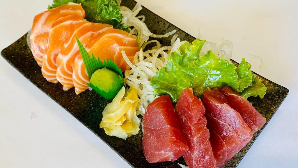 Tuna and Salmon Sashimi (8 pcs) · 4 pcs each of Tuna and Salmon Sashimi