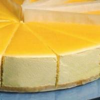 Mango Mousse Cake · A refreshingly light and exotic cake that is the perfect combination of sponge cake & smooth...