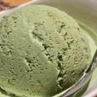 A scoop of ice cream · Choose from Green Tea, Kona Coffee or Rainbow Sherbet flavors