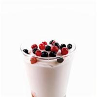 Coppa Yogurt & Berries · Yogurt gelato swirled together with mixed berry sauce, topped with blueberries & currants.