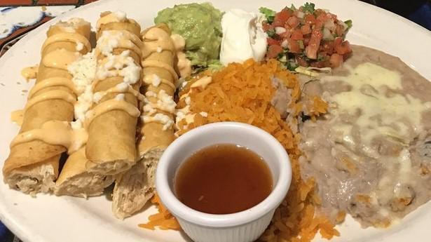 Flautas · Chicken and cheese rolled in flour tortilla served with sour cream, guacamole, pico de gallo, and spicy pineapple jelly on the side.